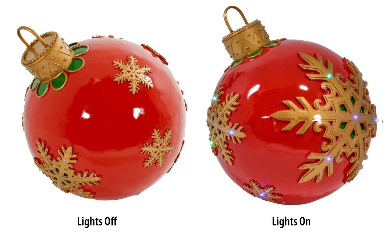 Illuminated Christmas Red Ornament with LED Lights Close Up Image