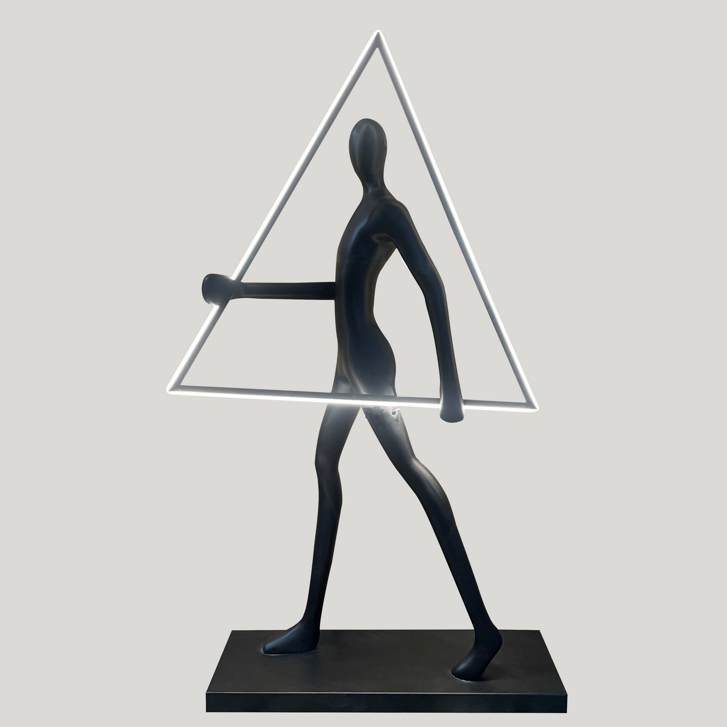 Small Black Sculpture holding Triangle Light